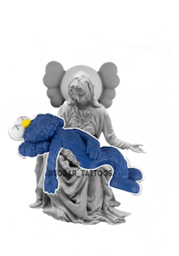 a statue of an angel laying on a bed
